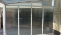 10. aluminium veranda met kunststofvlonders